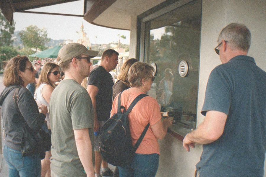 Visitors reading displays in a Griffith Observatory exhibit gallery
